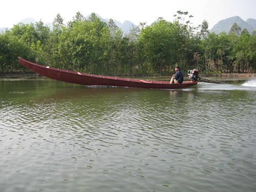 Motor boat in Yen river