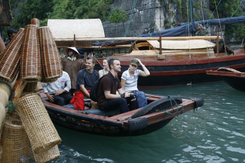 Small boat rowing to Fishing village